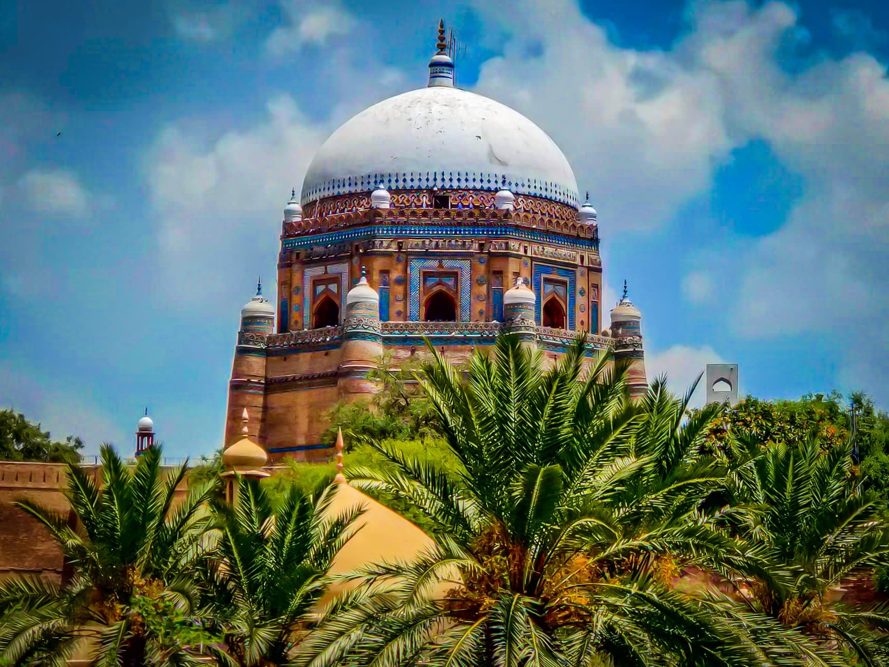 A vibrant, saturated shot of an ornate domed tomb...
